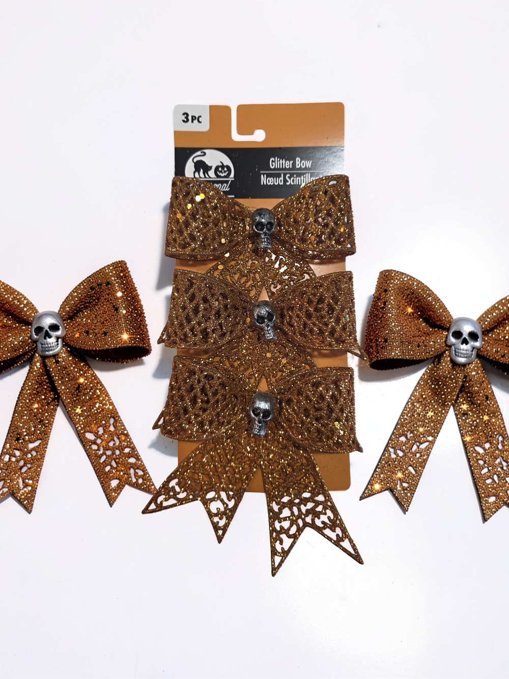 Expressions Metallic Orange Glitter Bows  with Skull Accent
